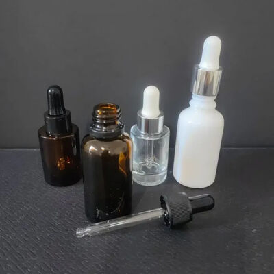 Thủy tinh Custom Slant Shoulder 1 Oz Mái tóc Essential Essence Packaging Skincare Serum chai 30ml Frosted Dropper chai với hộp