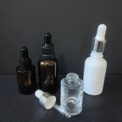 Nhà cung cấp chất lượng cao Chai tinh dầu thủy tinh Amber Clear Boston 2oz có ống nhỏ giọt 60ml cho serum