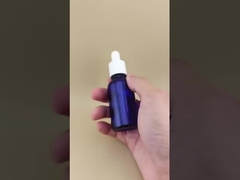 Thiết kế tinh tế, chai nhỏ giọt tròn, mịn, màu xanh dương đậm trong suốt dùng cho chăm sóc da