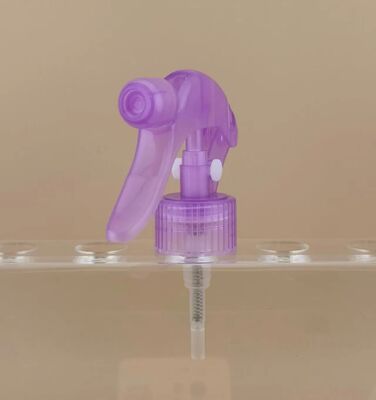 Máy xịt kích hoạt nhỏ màu tím để làm tóc