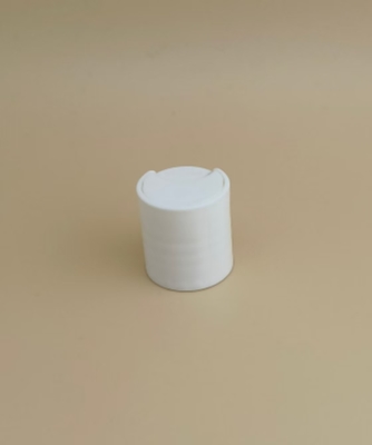 Chiếc nắp tròn màu trắng nhỏ cho chai chăm sóc da